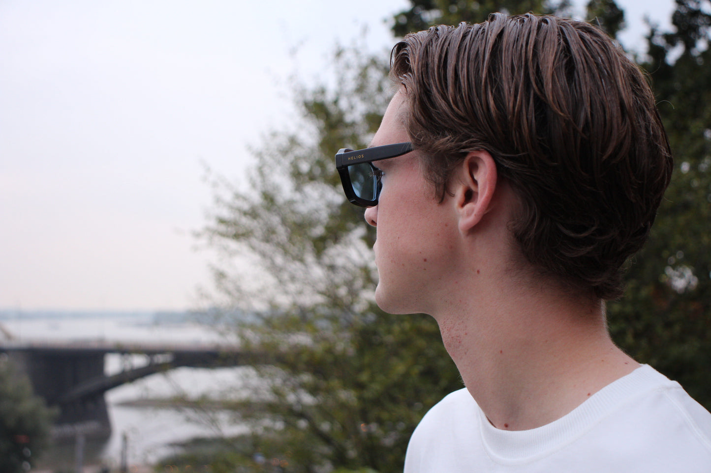 Person wearing sunglasses with a blurred background