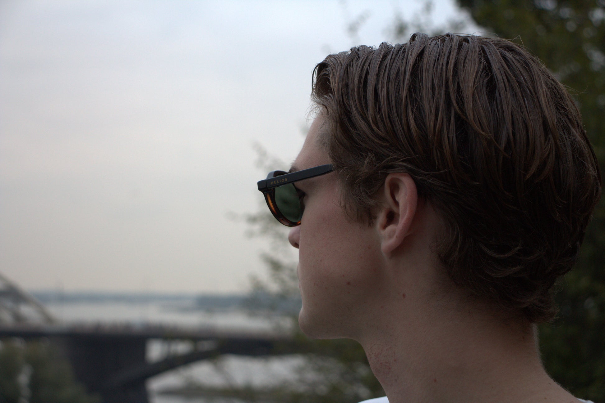 Person wearing sunglasses with a blurred background